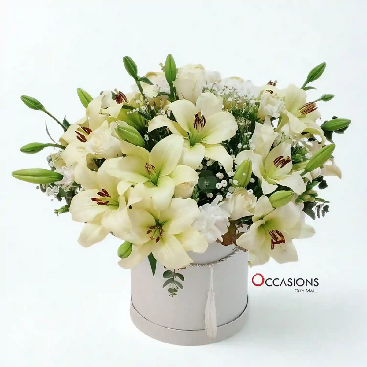 Elegant Lily Cylinder Arrangement - buy these flowers online from the best flower shop in Jordan with fast delivery across Amman