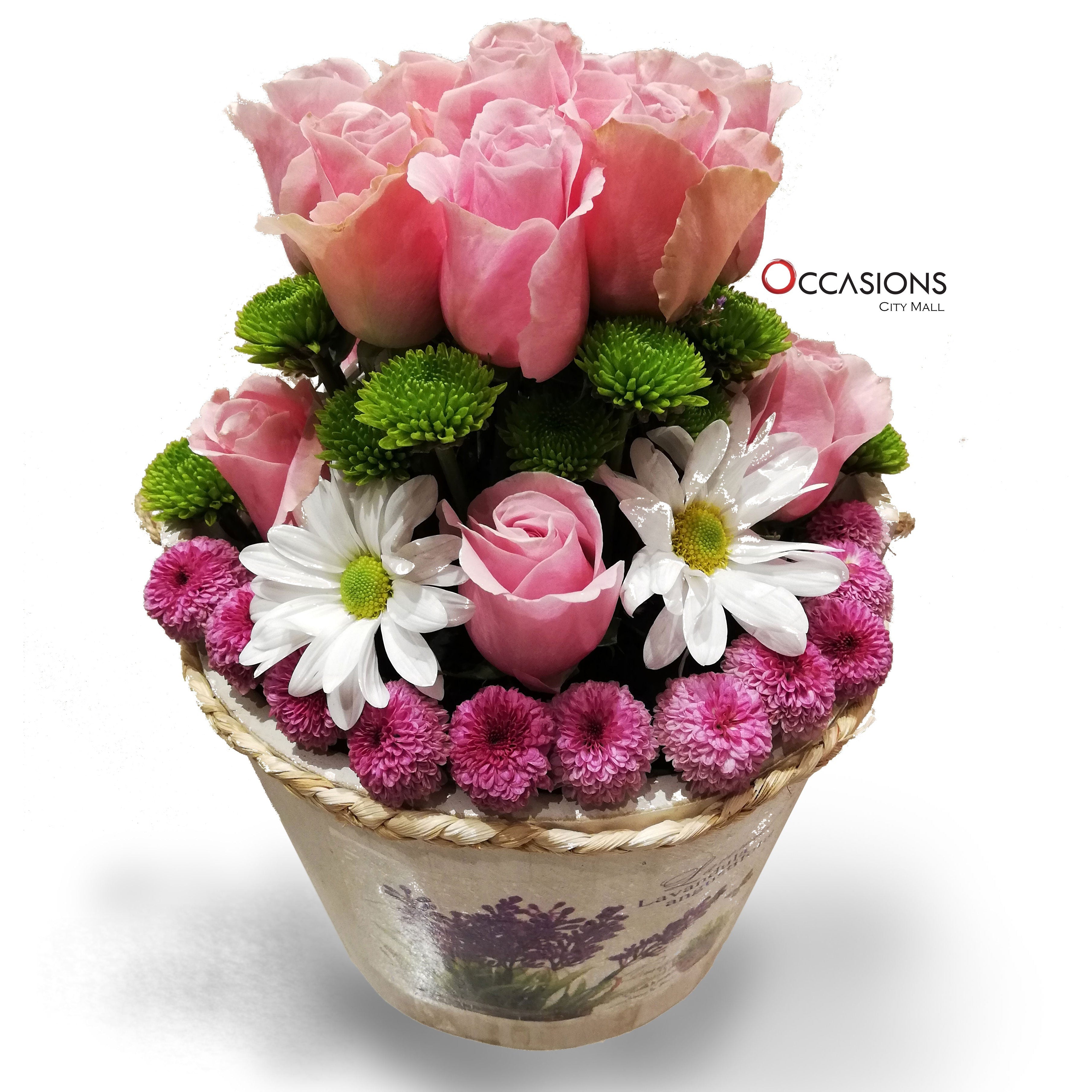 Pink Flowers in Lavender basket send_delivery_Amman_Jordan